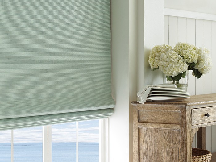 Window featuring Provenance® Woven Wood Shades.